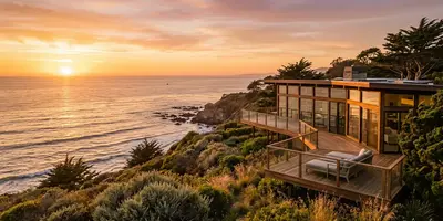 Home near the ocean with the sun setting